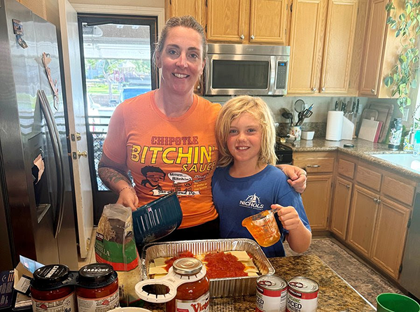 The Bitchin’ Sauce team rolled up their sleeves and fired up their ovens to support families in need through a partnership with Lasagna Love